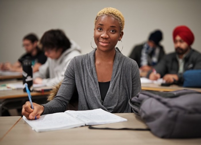 student smiling in class