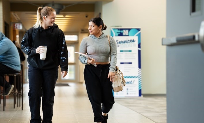 students walking towards camera